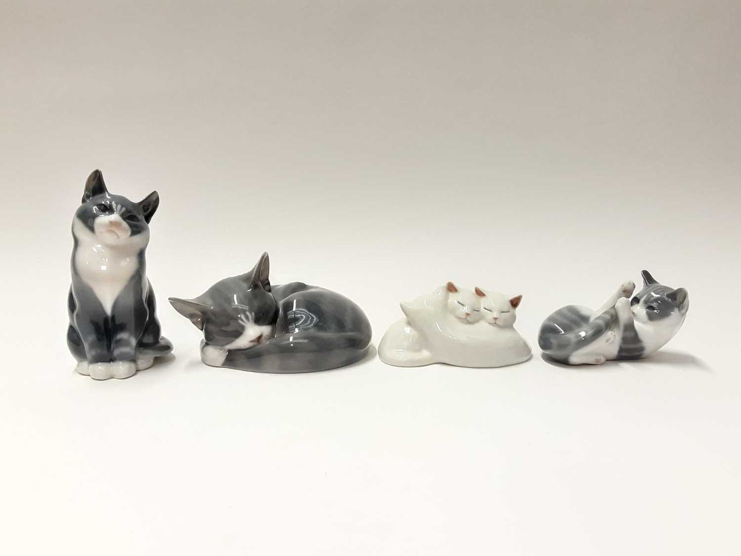 Lot 153 - Four Royal Copenhagen cats, model numbers 304, 1803, 222 and 422