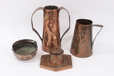 Lot 702 - Late 19th/early 20th century Arts and Crafts beaten copper jug, two further vessels