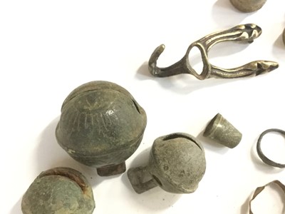 Lot 42 - Group of metal detecting finds to include crotal bells, thimbles and rings