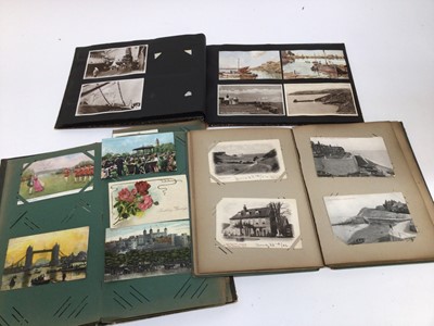 Lot 766 - Mixed ephemera including Three postcard album themes include Greeting, Angels, Father Christmas ,Real Photographic and Modern. Plus one album of stuck-in postcards.  Photographs in album and loose,...