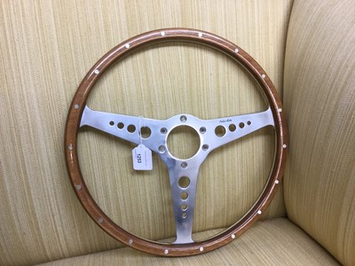 Lot 1253 - Moto-Lita custom steering wheel - bought for an E type Jaguar and not fitted 38cm diameter