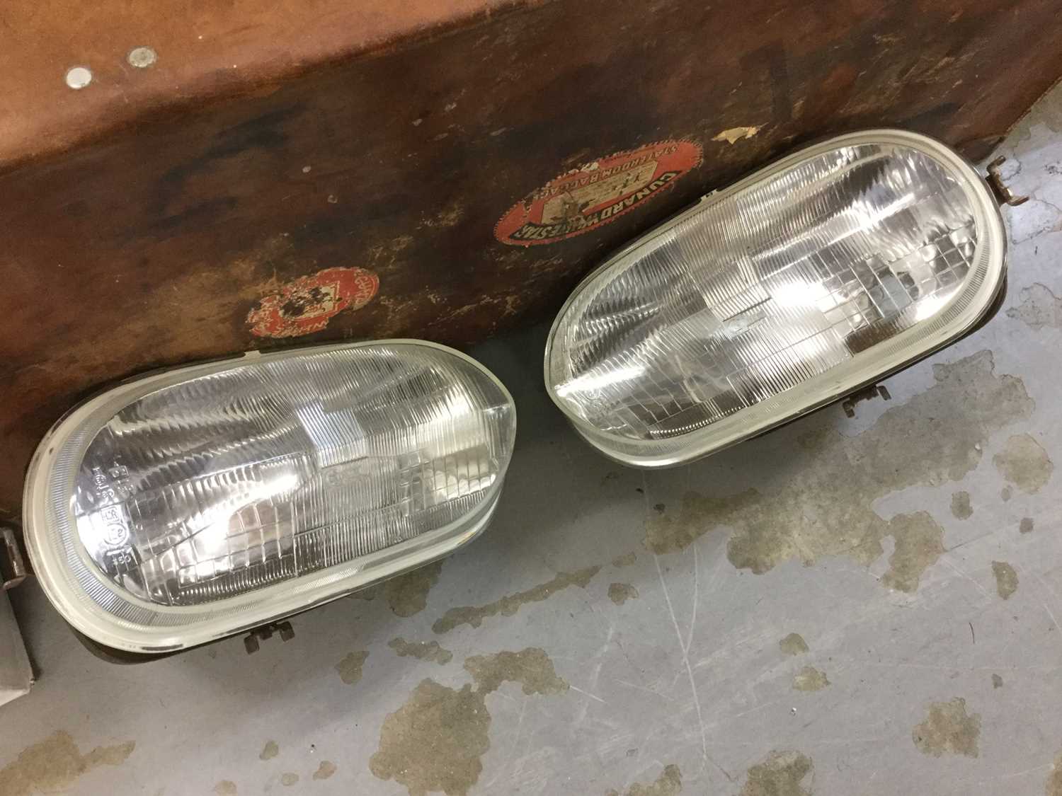 Lot 1254 - Pair of Jaguar XJS headlamps in excellent original condition