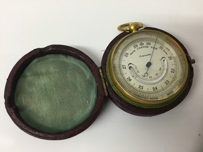 Lot 1075 - Early 20th century brass pocket barometer