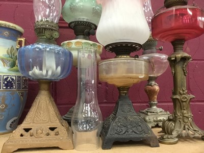 Lot 374 - Collection of five antique oil lamps