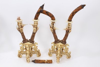 Lot 848 - Highly unusual pair of ceramic candlestick imitating carved antlers