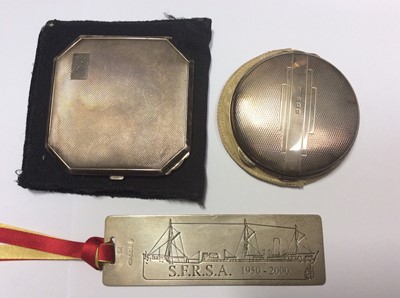 Lot 504 - Two 1940s silver powder compacts and silver bookmark