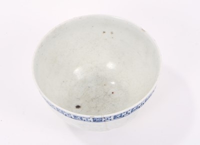 Lot 8 - Rare Lowestoft tea bowl, moulded in relief with flowers, key and cell border above, 7.5cm diameter