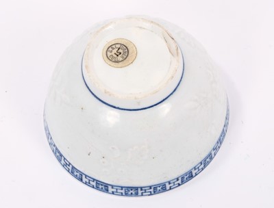 Lot 261 - Rare Lowestoft tea bowl, moulded in relief with flowers, key and cell border above, 7.5cm diameter