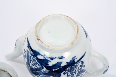 Lot 14 - Lowestoft teapot and cover, of globular form, printed in blue with a variant of the Birds in Branches pattern, within loop borders, 15cm high