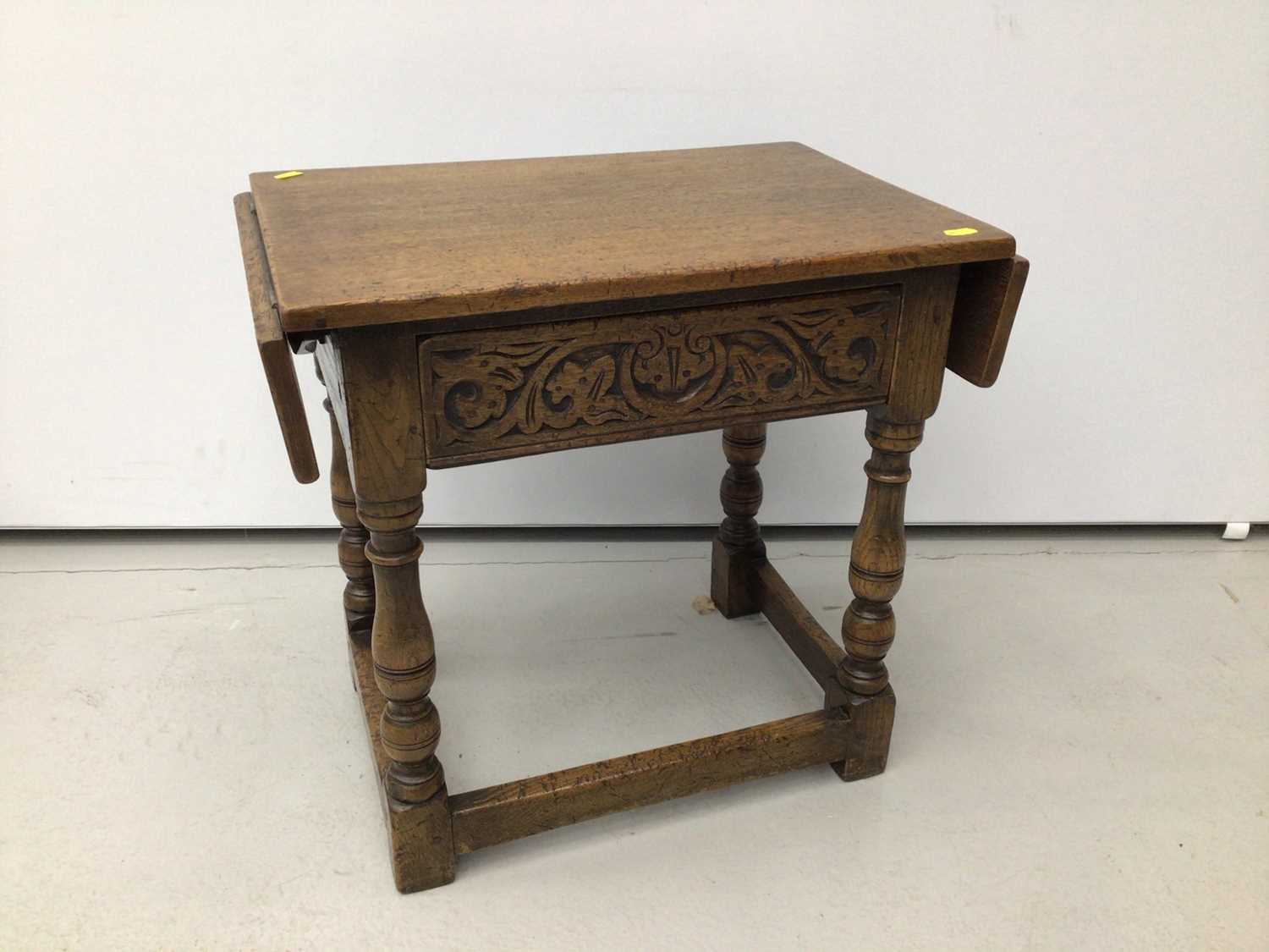 Lot 2 - Good quality 17ty century style carved oak drop leaf side table 51cm wide