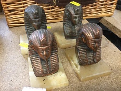 Lot 472 - Group of four Egyptian style book ends on alabaster bases