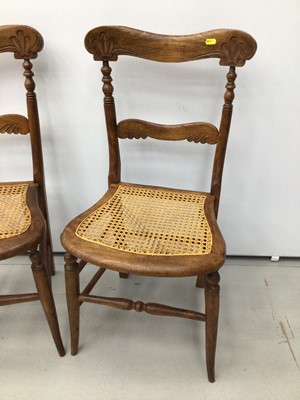 Lot 6 - Edwardian marquetry inlaid elbow chair, together with a Regency mahogany dining chair and pair of Victorian beech and caned side chairs. (4)