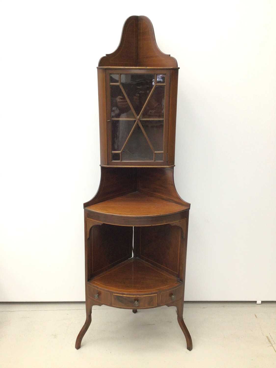 Lot 9 - 19th century inlaid mahogany corner cupboard, standing on bowfronted base, adapted from a corner washstand