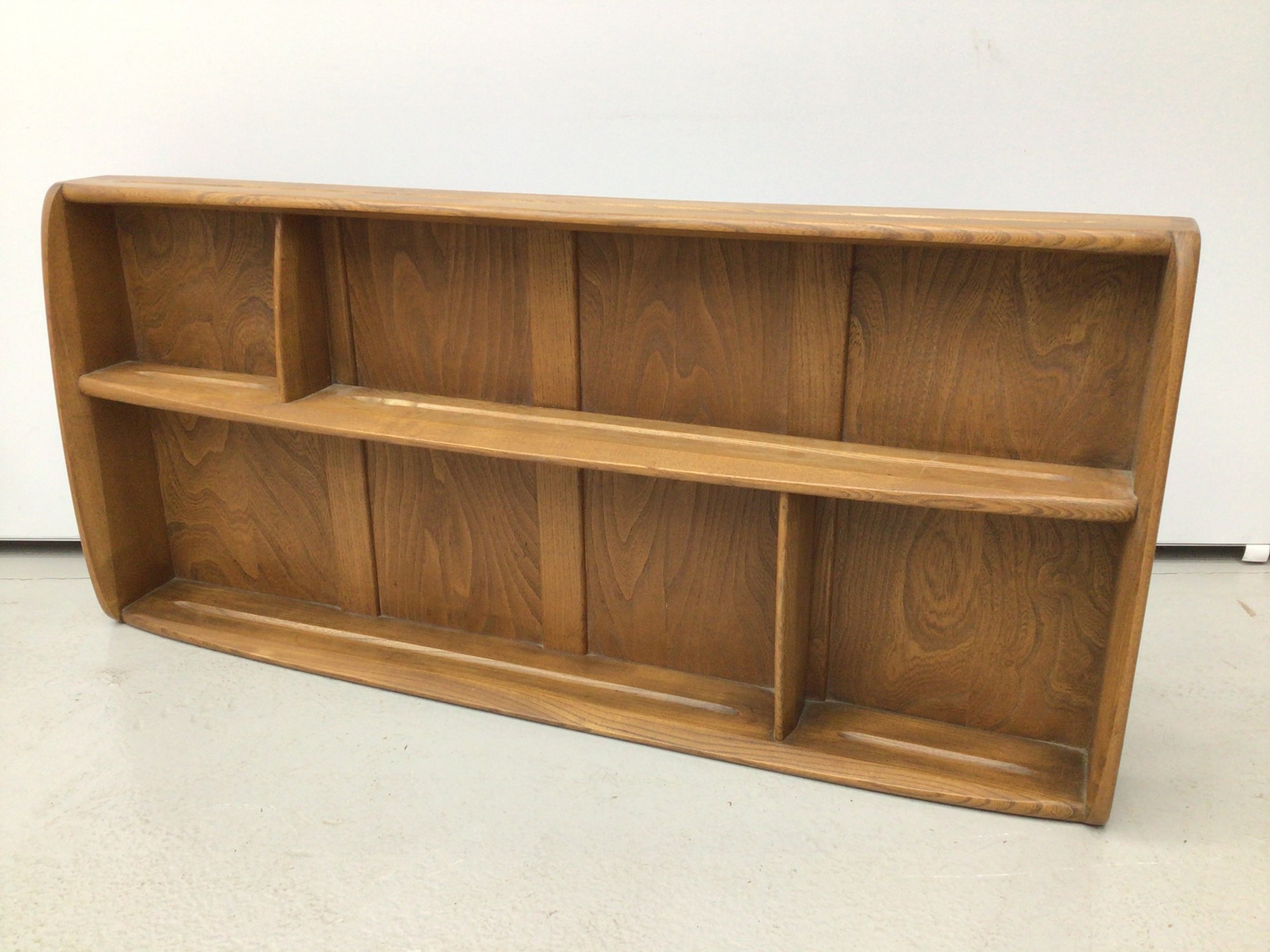 Lot 12 Ercol golden dawn wall hanging shelves,