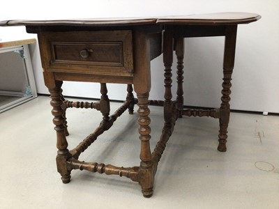 Lot 73 - Late 17th / early 18th century and later cherry wood gateleg table
