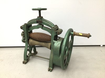 Lot 75 - Unusual early 20th century leather rolling machine
