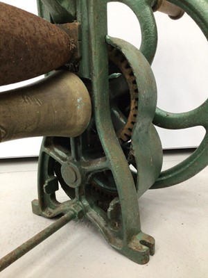 Lot 27 - Unusual early 20th century leather rolling machine