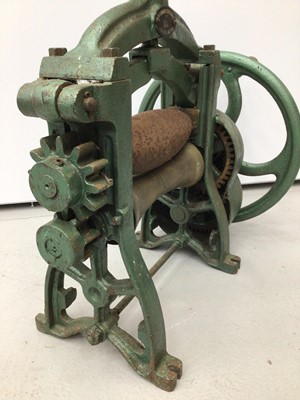 Lot 75 - Unusual early 20th century leather rolling machine