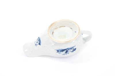 Lot 265 - Small Lowestoft sauceboat, moulded with panels edged with shells and flowering plants, painted in blue with a fisherman in Chinese river scenes, painter's number 3, 14cm long