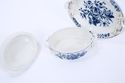 Lot 26 - Lowestoft butter tub, cover and stand, of oval form with twig handles applied with flower and leaf terminals, printed in blue with scattered floral sprays and sprigs, stand 19.3cm wide