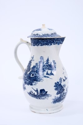 Lot 32 - Lowestoft jug and cover, with a scrolled handle and a low domed cover, printed with a Chinese river cane below a printed cell border, 22.2cm high