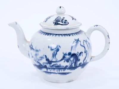 Lot 35 - Lowestoft teapot and cover, of globular form, painted in blue with a boy crossing a bridge within a berry border, the cover printed with Chinese islands, painter's number 3 inside footrim, 14.5cm h...