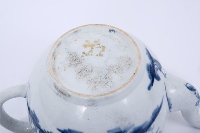 Lot 35 - Lowestoft teapot and cover, of globular form, painted in blue with a boy crossing a bridge within a berry border, the cover printed with Chinese islands, painter's number 3 inside footrim, 14.5cm h...