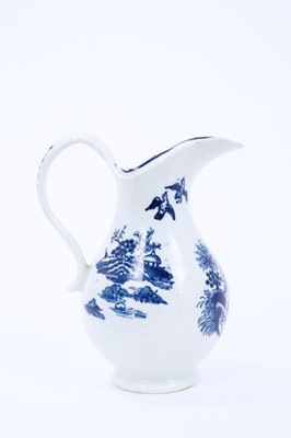 Lot 36 - Lowestoft ewer, of pear shape with a high scrolled handle, printed in blue with the Fence pattern, crescent mark, 14cm high