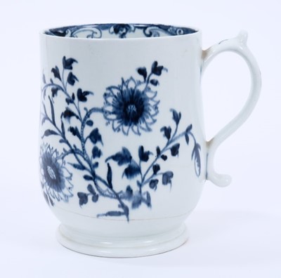 Lot 37 - Two Lowestoft bell mugs, the first painted in blue with two flowering stems, a smaller sprig and a moth to the reverse, painted border inside, painter's number 5 inside footrim, 14cm high, and the...