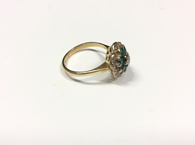 Lot 517 - 18ct gold emerald and diamond cluster ring. Size K½