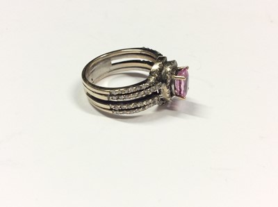 Lot 519 - 18ct white pink topaz and diamond ring. Size L½