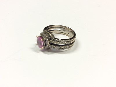Lot 519 - 18ct white pink topaz and diamond ring. Size L½