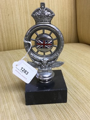 Lot 1283 - Royal Automobile Club members badge, no. MCB18967, mounted on marble base, 18cm in overall height