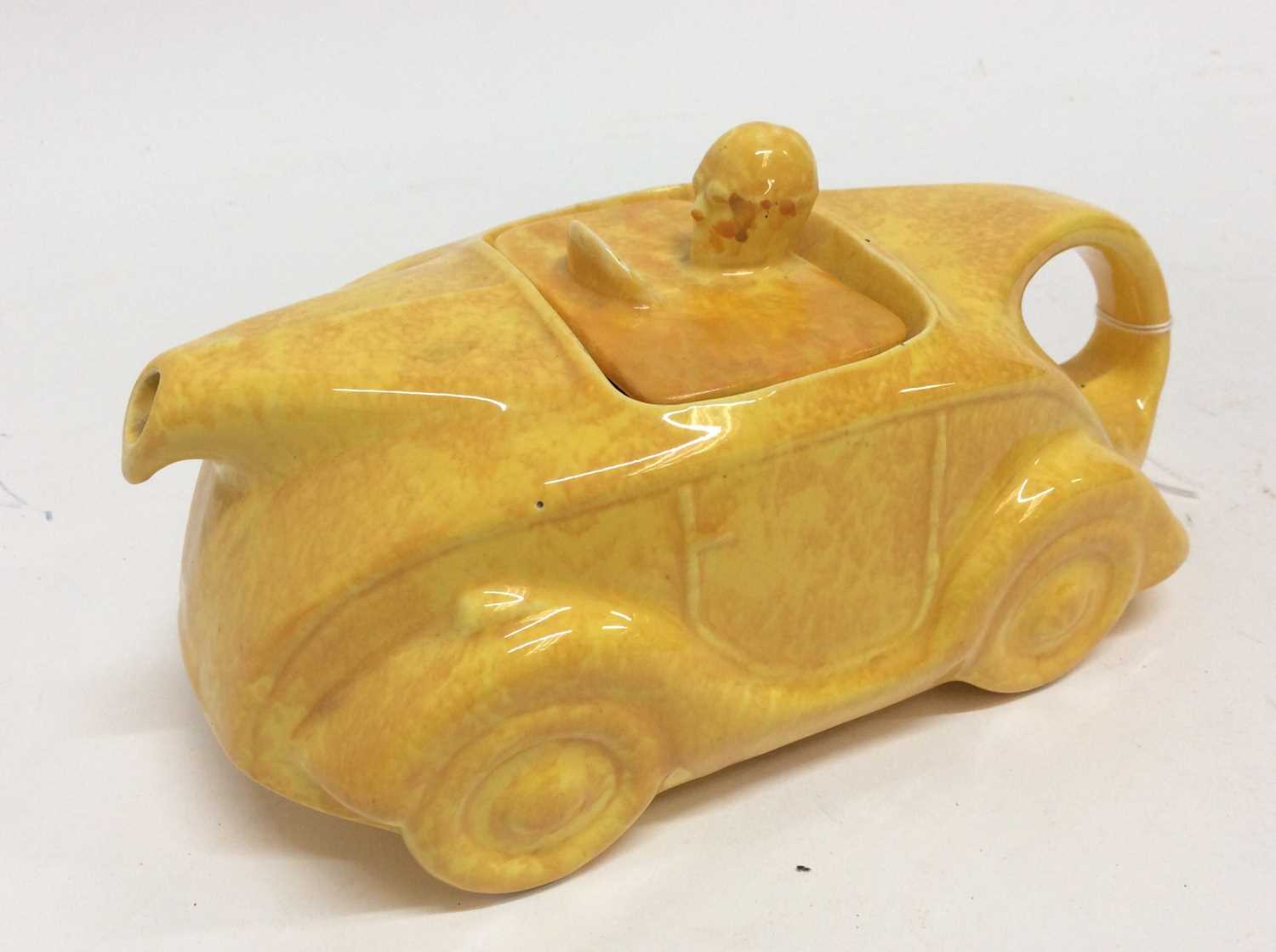 Lot 1285 - Sadler Racing car teapot in mottled yellow glaze, with printed and impressed marks to base.