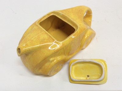 Lot 1285 - Sadler Racing car teapot in mottled yellow glaze, with printed and impressed marks to base.