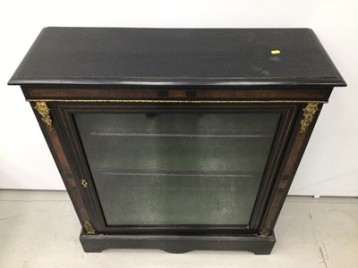 Lot 60 - Victorian ebonised and gilt metal mounted pier cabinet, enclosed by glazed door on shaped plinth, 93cm wide x 29cm deep x 103cm high