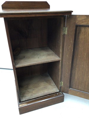 Lot 61 - Late 19th / early 20th century pot cupboard, enclosed by panelled door on plinth base, 43cm wide x 42cm deep x 76cm high, together with a similar cupboard. (2)