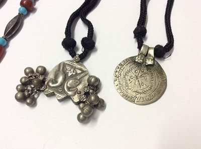 Lot 532 - Group of eleven Eastern white metal pendant and bead necklaces