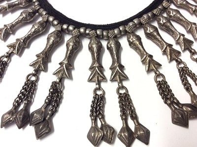 Lot 340 - Group of eleven Eastern white metal pendant and bead necklaces