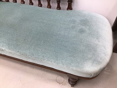 Lot 68 - Victorian mahogany chaise longue, with blue velvet button upholstery on castors