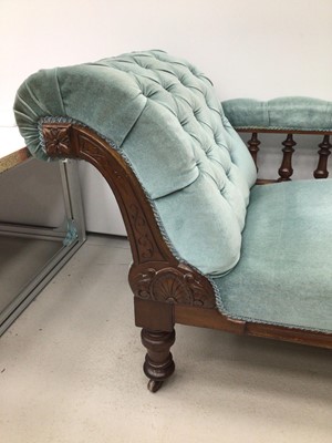 Lot 68 - Victorian mahogany chaise longue, with blue velvet button upholstery on castors