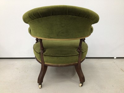 Lot 86 - Victorian mahogany tub chair, green upholstery on fluted legs and castors