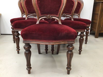 Lot 93 - Set of six Victorian Scottish mahogany balloon back dining chairs upholstered in red velvet with polished mahogany frame, padded backs and seats on carved baluster turned legs
