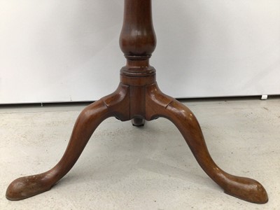 Lot 94 - George III mahogany wine table with circular dished top on birdcage mechanism,the baluster turned column with three hipped splayed legs terminating on pad feet.