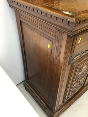 Lot 95 - Edwardian carved oak two height sideboard with mirrored back, Corinthian column supports, drawers and cupboards below.