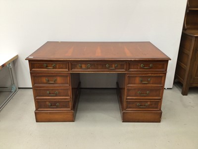 Lot 103 - Georgian style yew wood finished twin pedestal desk with nine drawers, 137cm wide x 76cm deep x 73cm high