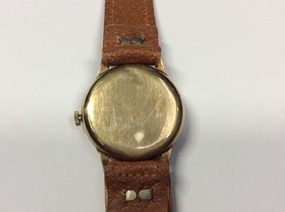 Lot 541 - Trebex 9ct gold cased wristwatch with gold coloured face, Arabic numerals and subsidiary seconds dial, on brown leather strap