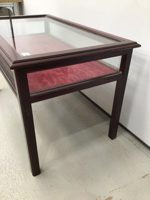 Lot 125 - Mahogany display table/coffe table enclosed by glazed hinged top with velvet lined interior and glazed sides on square moulded chamfered mahogany legs, 84cm wide x 48cm deep x 48cm high