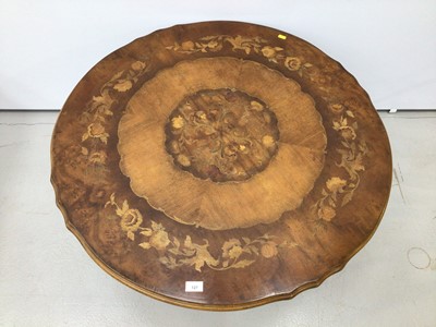 Lot 127 - 19th century style Italian floral marquetry inlaid coffee table with shaped oval top on turned pedestal with four carved scroll legs