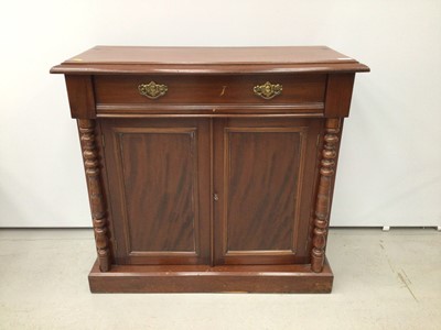 Lot 128 - Victorian mahogany chiffonier with drawer and cupboard below enclosed by two panelled doors flanked by turned columns on plinth base, 92cm wide x 37cm deep x 85cm high